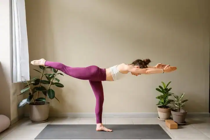 Achieving the Perfect Tone: How Often Should You Exercise for Results? 1 Woman doing Yoga exercise Wiltshire to help with toning the body.