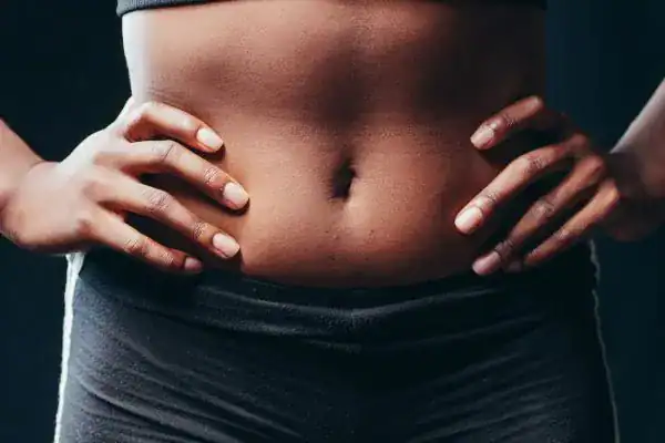 Toning Your Stomach: The Ultimate Guide to Achieving a Sculpted Stomach While Shedding Pounds 1 Image of a toned stomach after non surgical treatment Wiltshire